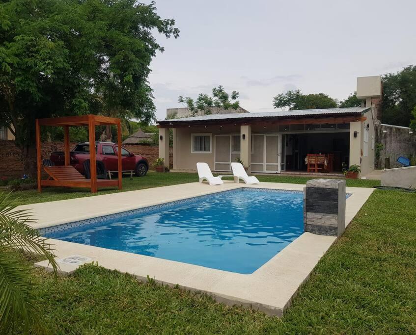 Holiday home Casa Con Piscina Paso De La Patria. Bitcoin's House.
